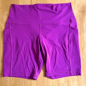 Lululemon Fuschia Biker shorts with POCKETS! Size 12